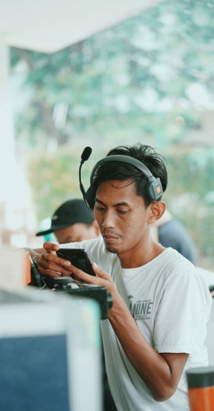 a-man-wearing-headphones.jpg a man wearing headphones